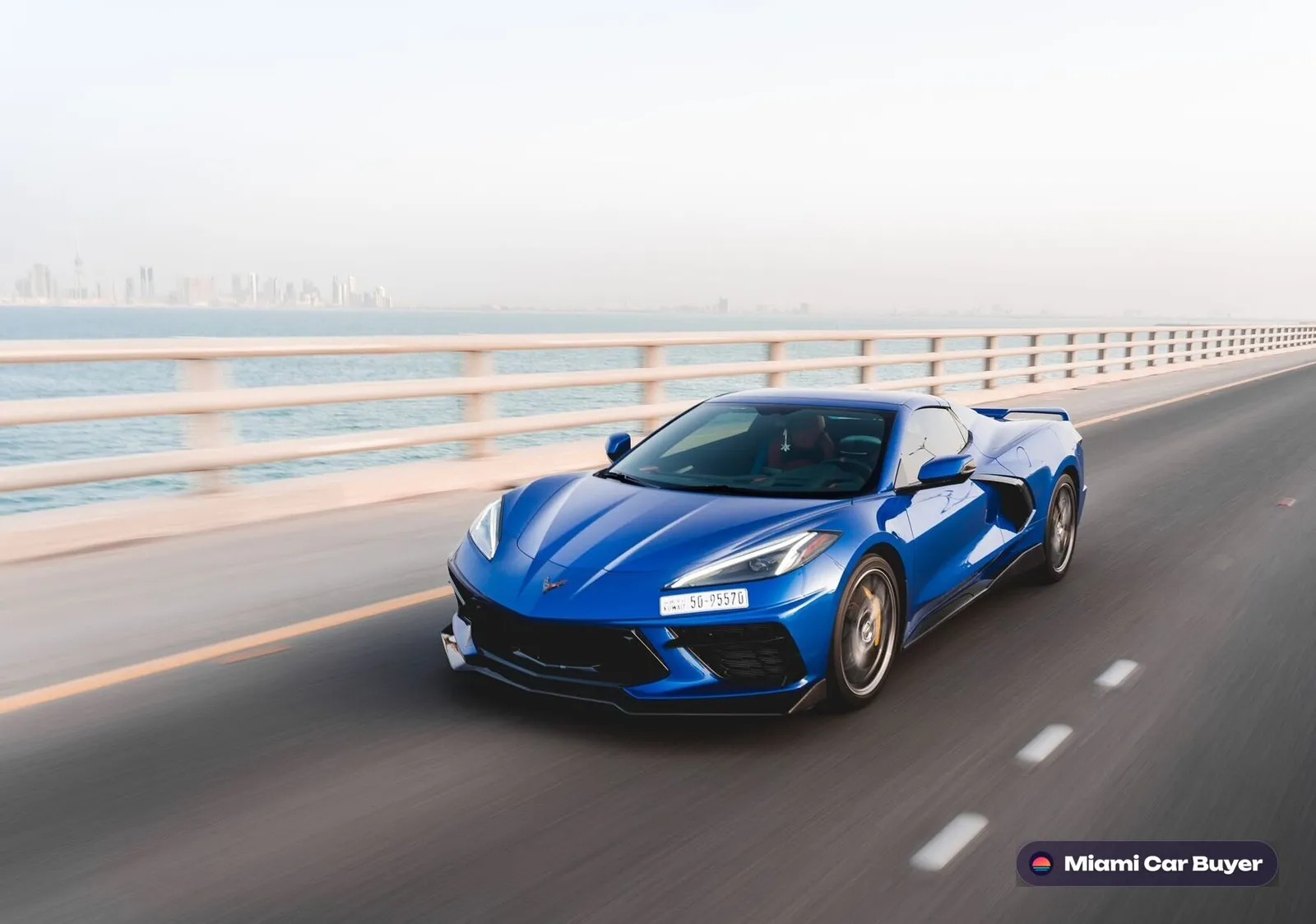 Blue supercar on an open Miami road - Miami Car Buyer pays cash for any car
