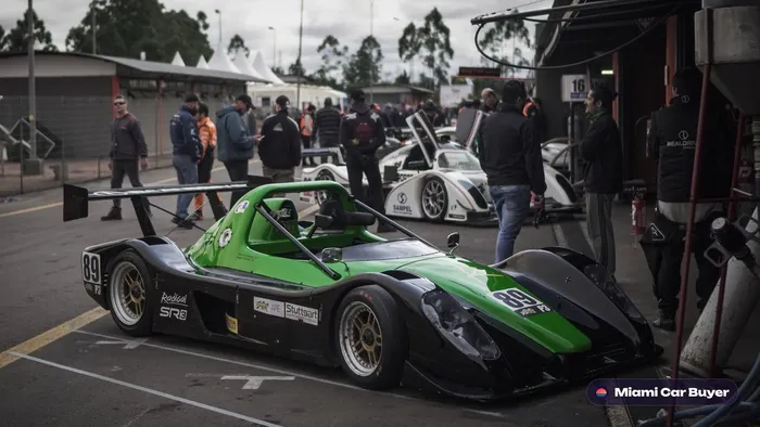 Green sports, the kind of car sold for cash across Miami-Dade