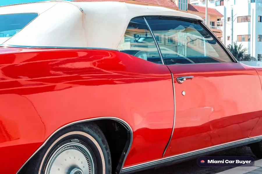 Vintage car parked on a tight residential street in Little Havana