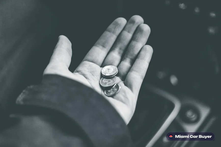 Cash counted into a seller's hand at a North Miami pickup