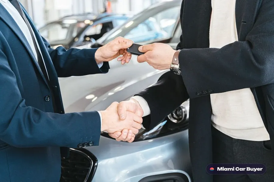 Cash and keys handed over at a Doral vehicle pickup