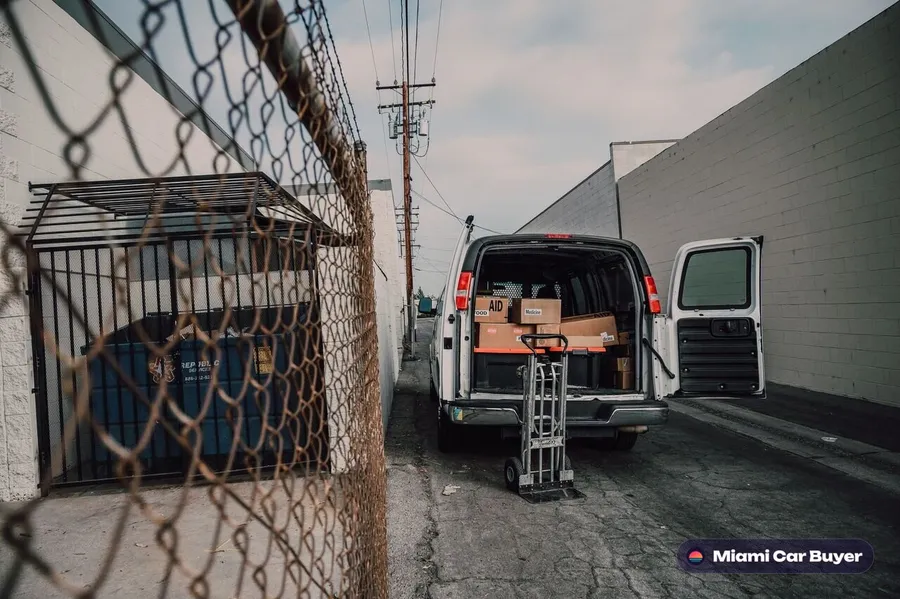 Fleet van loaded on a flatbed for free pickup in Doral